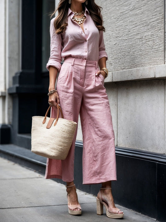 Completo di pantaloni Capri rosa e camicia larga